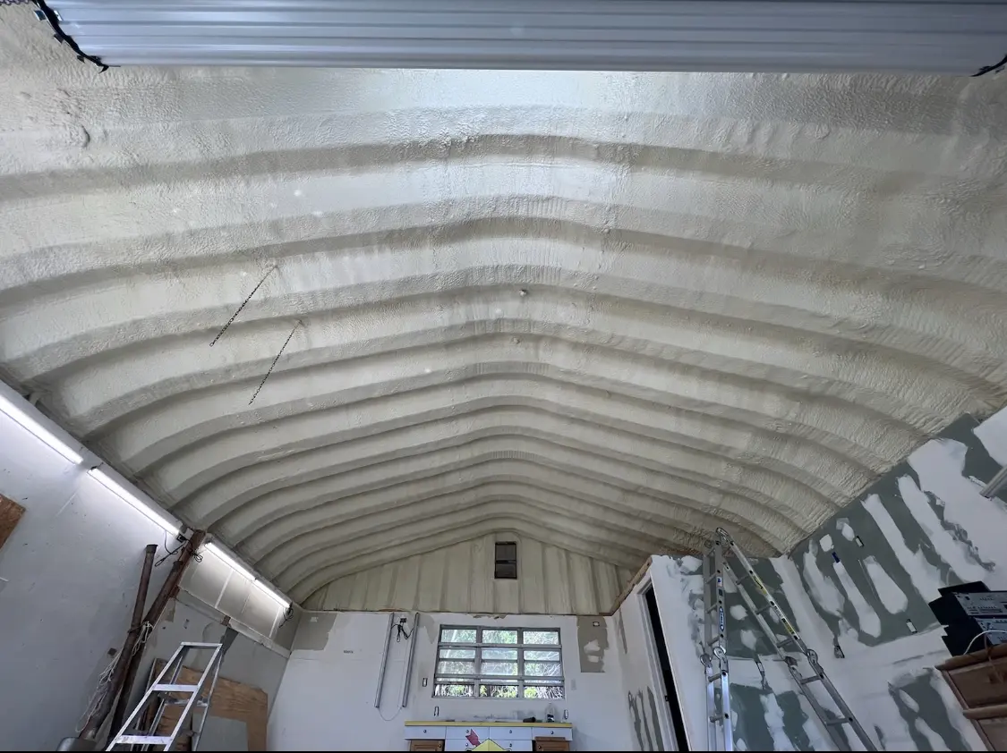 Spray polyurethane foam applied to the underside of a metal roof deck in Ramona
